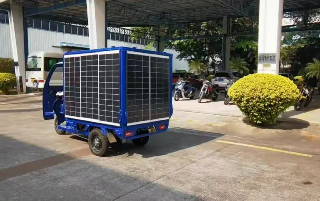 Electric trike climbing hill with solar assistance